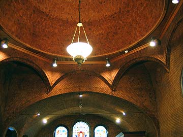 The interior is covered with scale shingles